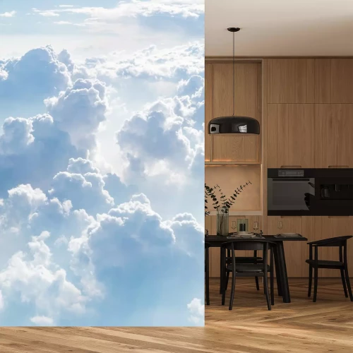 Sticker Blick auf flauschige weiße Wolken vor dem Hintergrund eines blauen Himmels