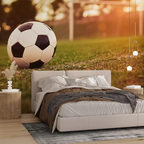 Fototapete Fußball im Sonnenuntergang