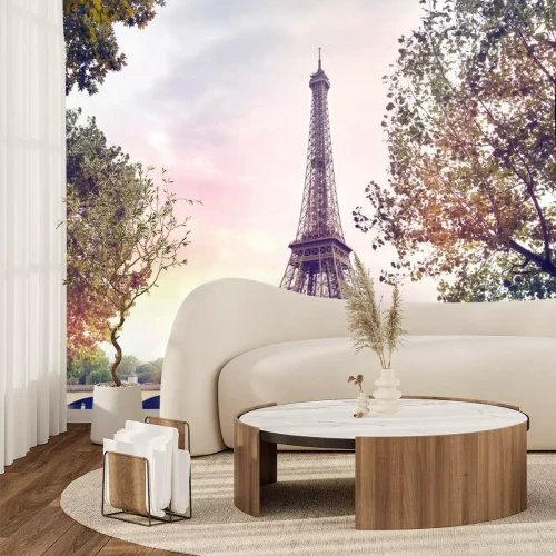 Fototapete Eiffelturm vor pastellfarbenem Himmel