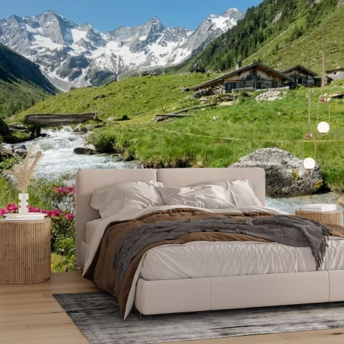 Fototapete Blumen und Bach in den Bergen