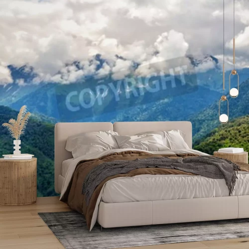 Fototapete Haufenwolken über den bergen