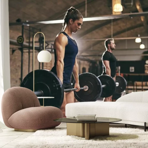 Fototapete Menschen, die eine Last auf einer Langhantel heben