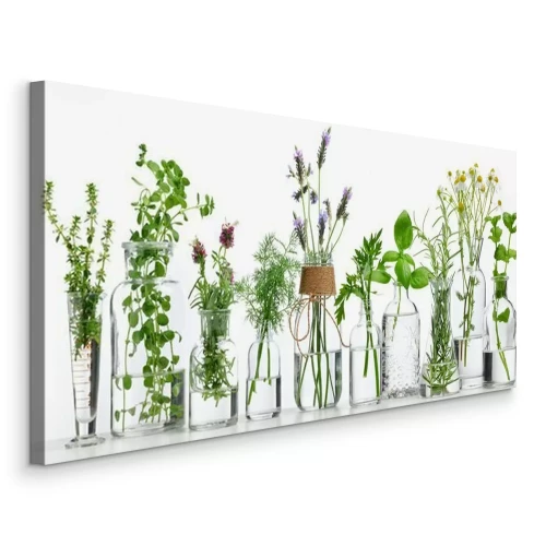 Bild Flasche ätherisches Öl mit Kräutern