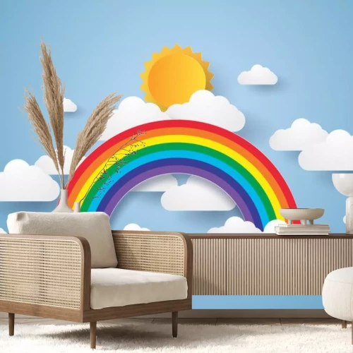 Sticker Regenbogen vor dem Hintergrund eines blauen Himmels mit Wolken und Sonne