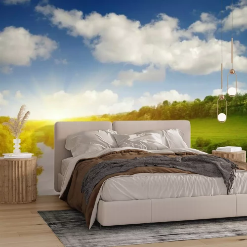 Fototapete Sonnenuntergang über einer Lichtung mit einem Fluss