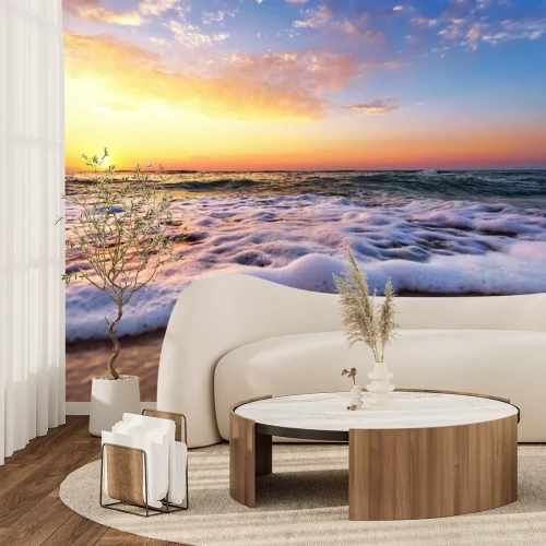 Fototapete Schaumige Wellen und Sonnenaufgang