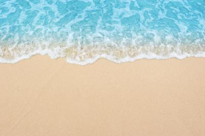 Fototapete Beautiful sandy beach and soft blue ocean wave