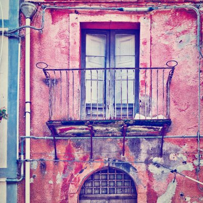 Fototapete Bunte fassade mit balkon