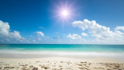 Fototapete Strand und volle Sonne am Meer