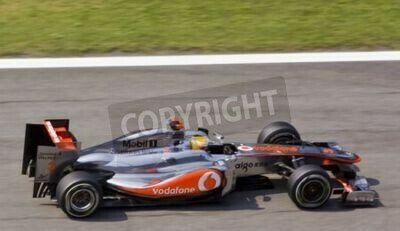 Fototapete Formel 1 Bolid auf der Rennstrecke