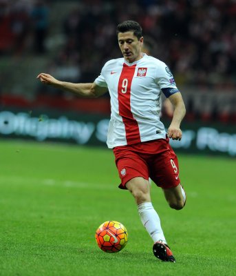 Poster Sportler Fußballer auf dem Feld