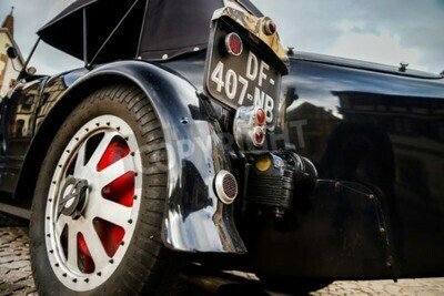 Fototapete Rückseite eines schwarzen Oldtimers
