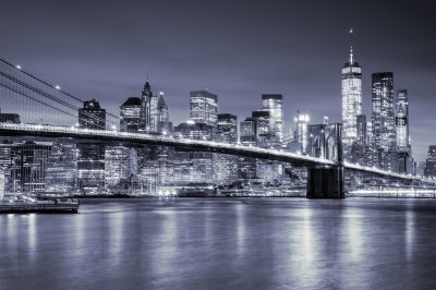 Fototapete Beleuchtete Skyline von Manhattan bei Nacht